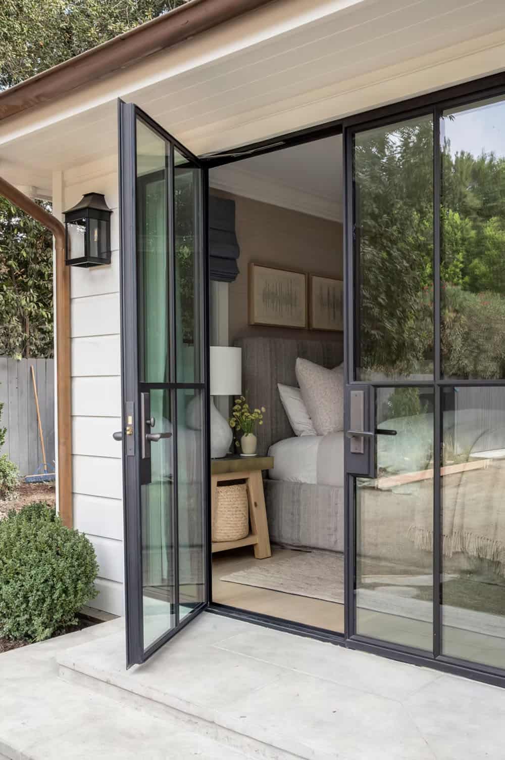 transitional style bedroom with French doors