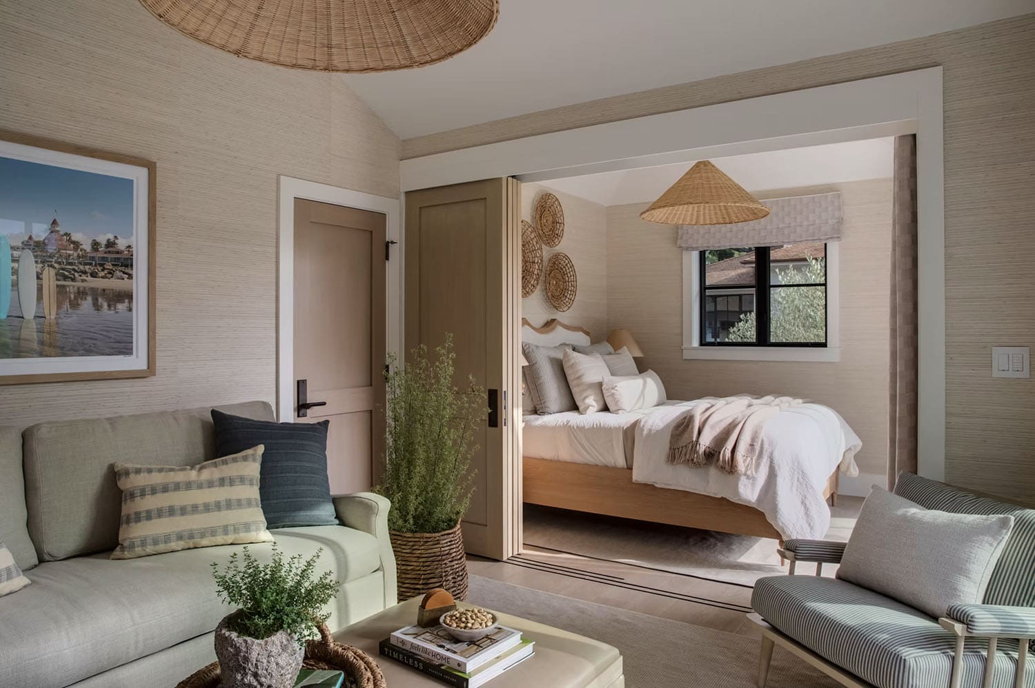 transitional style bedroom with a sitting area