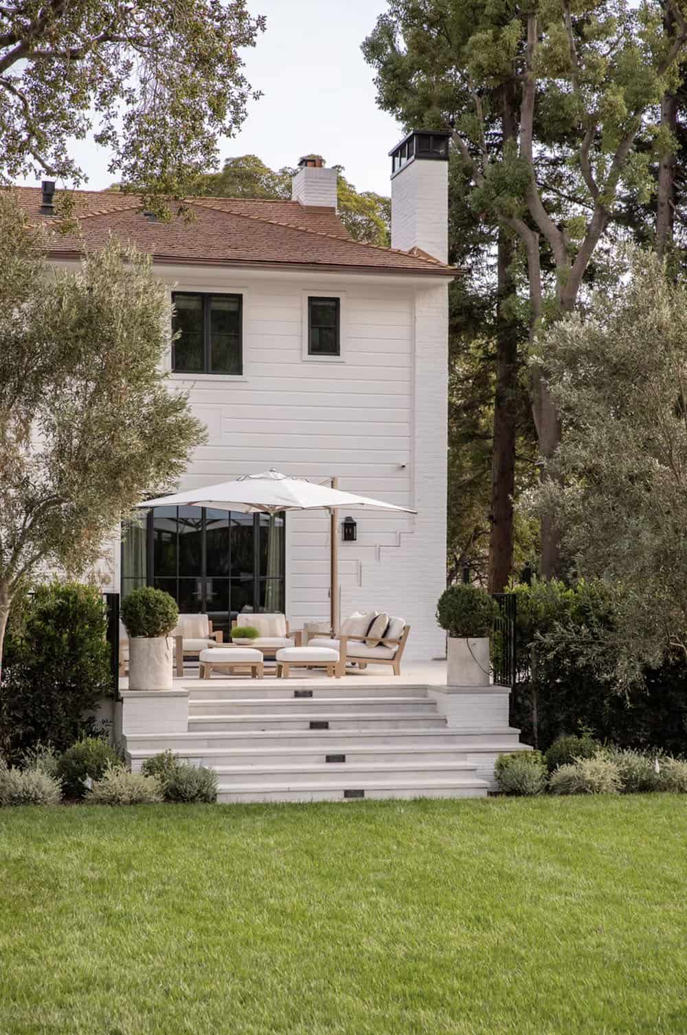southern inspired home exterior backyard view