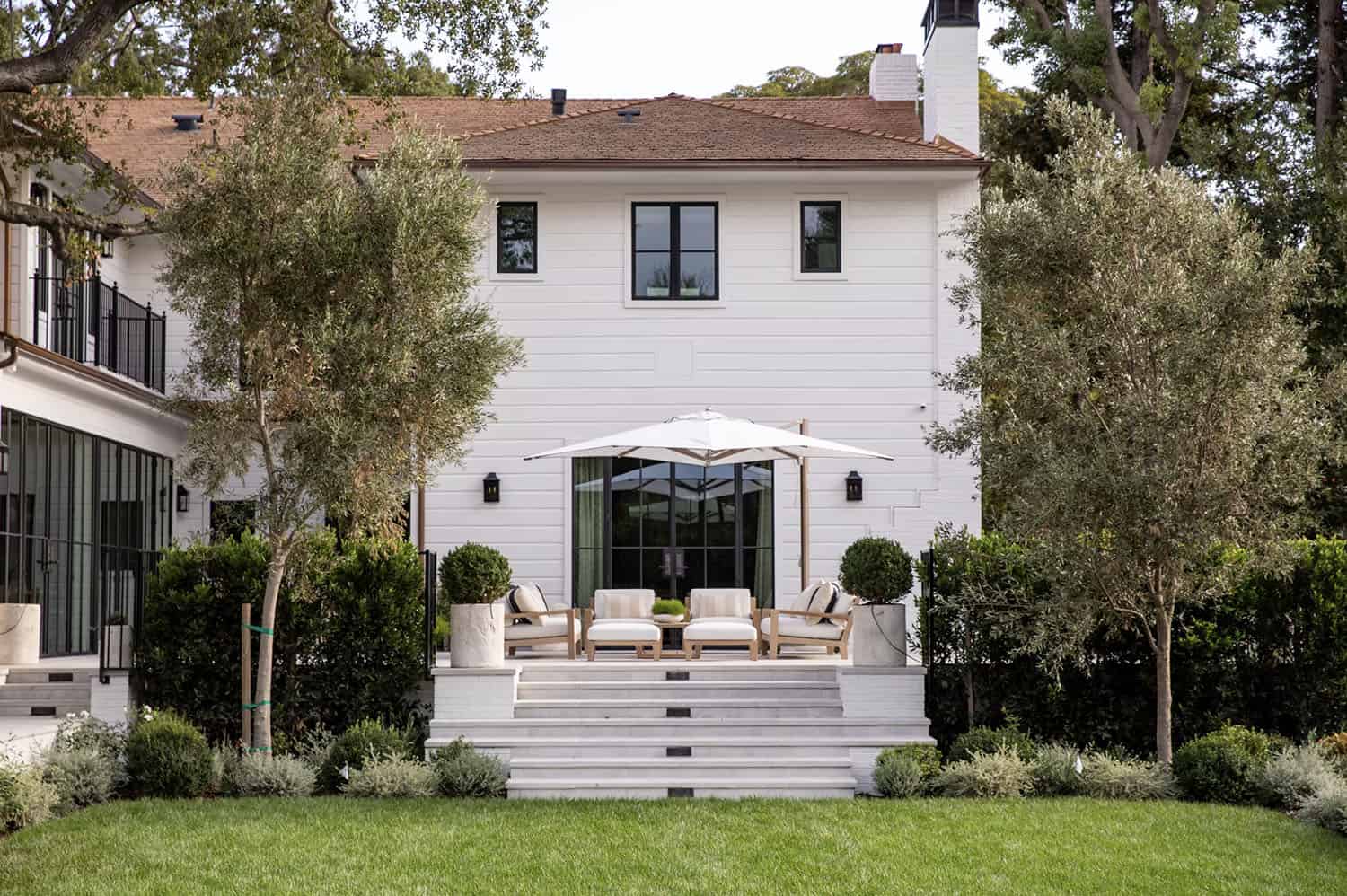 southern inspired home exterior backyard view