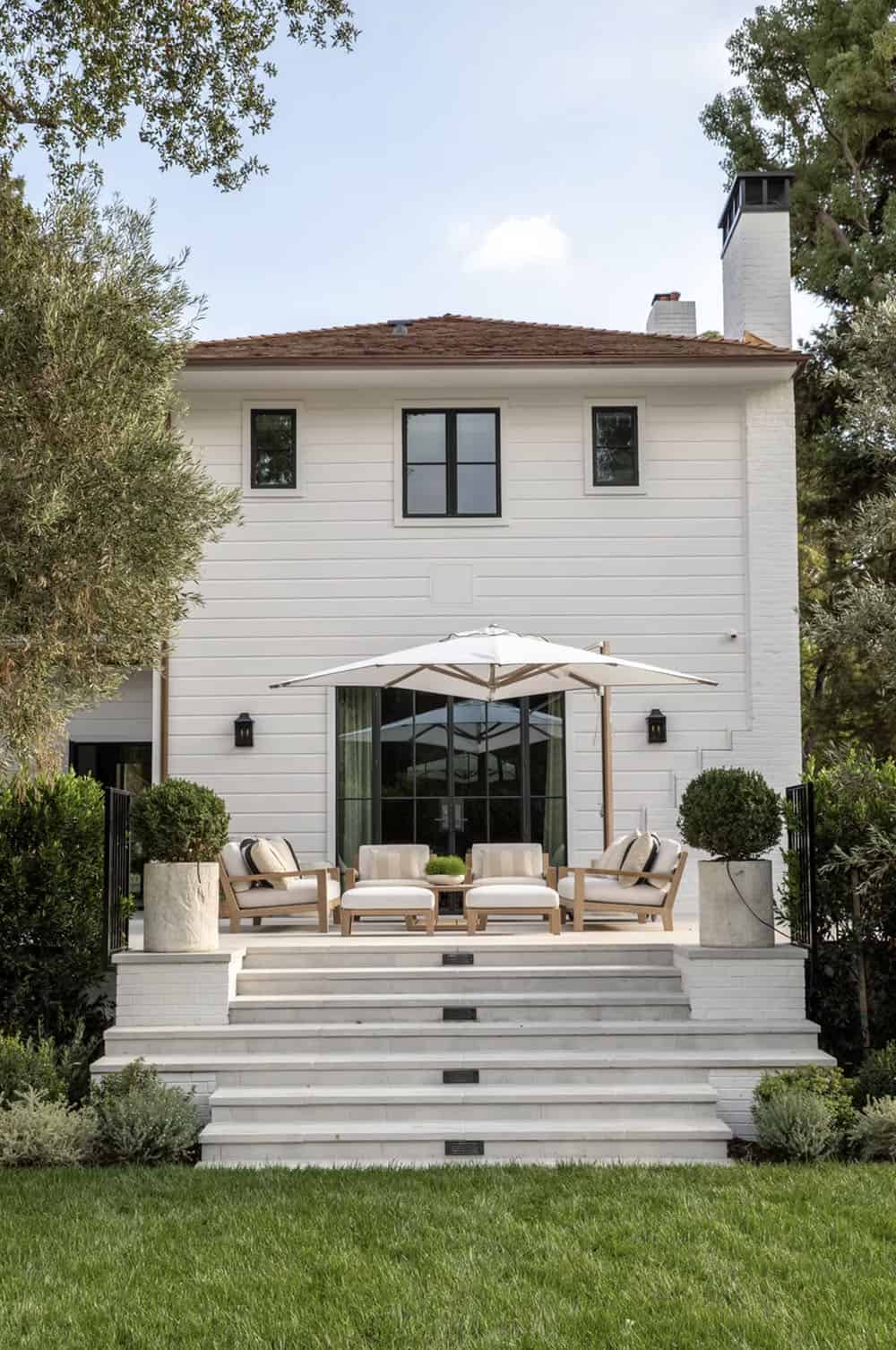 southern inspired home exterior backyard view