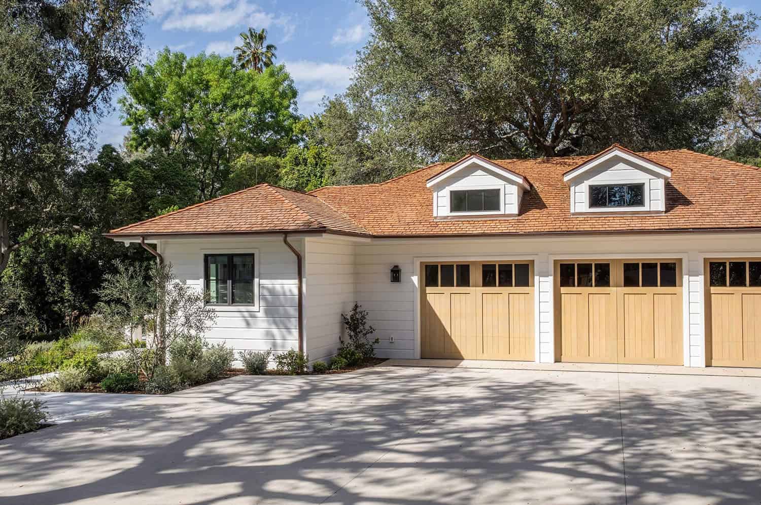southern inspired home exterior with a garage