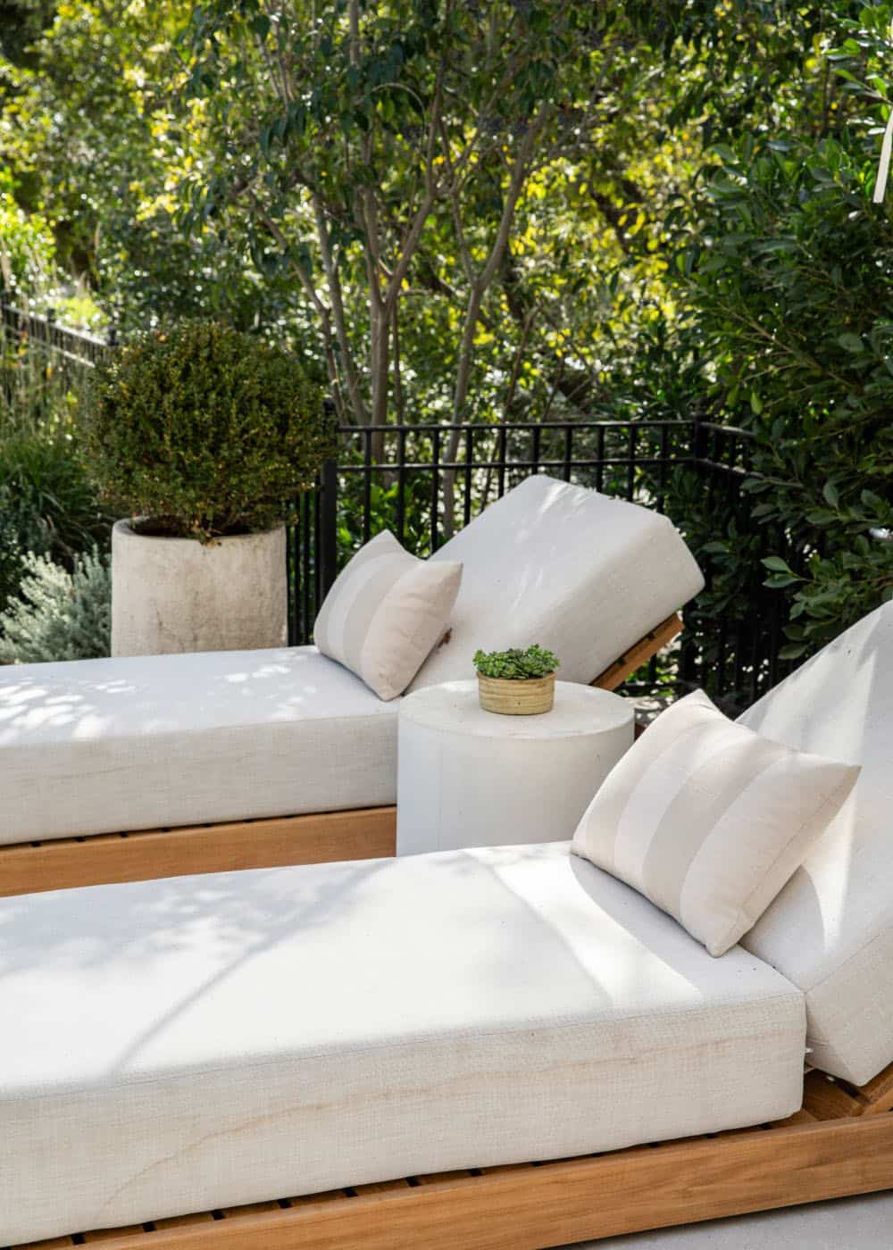 southern inspired home exterior with chaise lounges