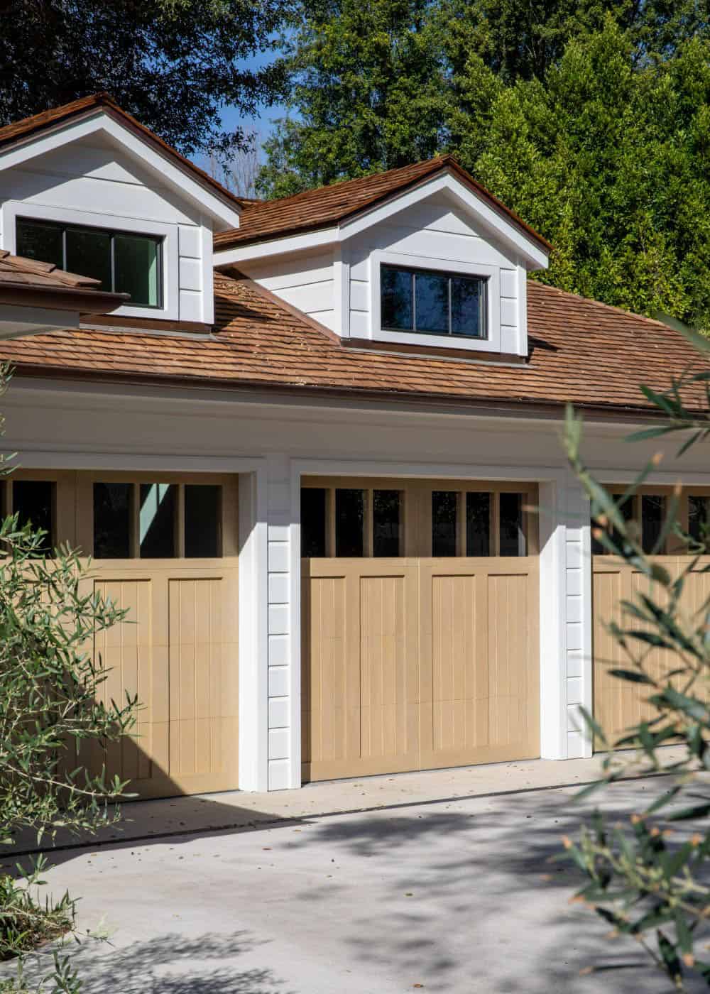 southern inspired home exterior with a garage