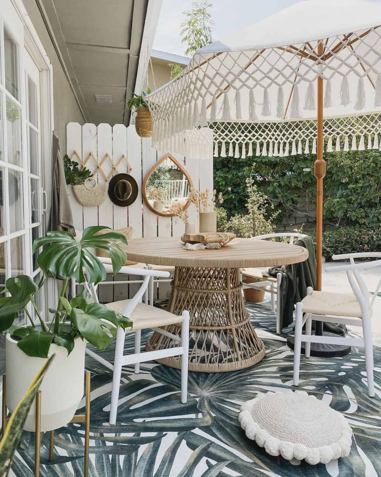 small backyard patio with a dining area