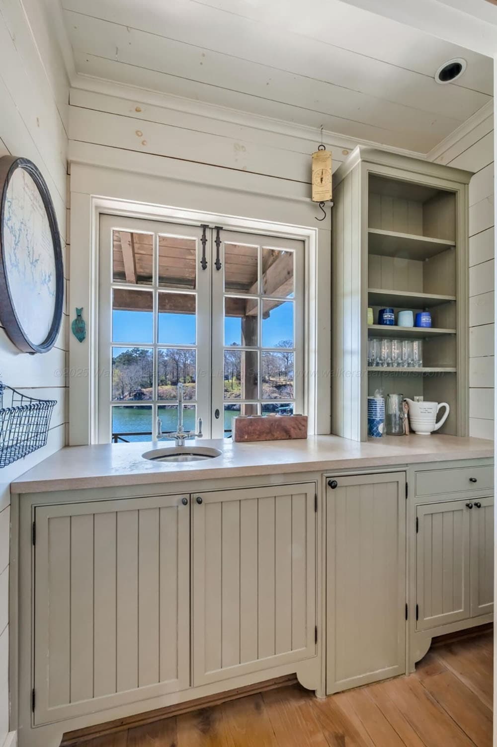 contemporary pantry with a sink