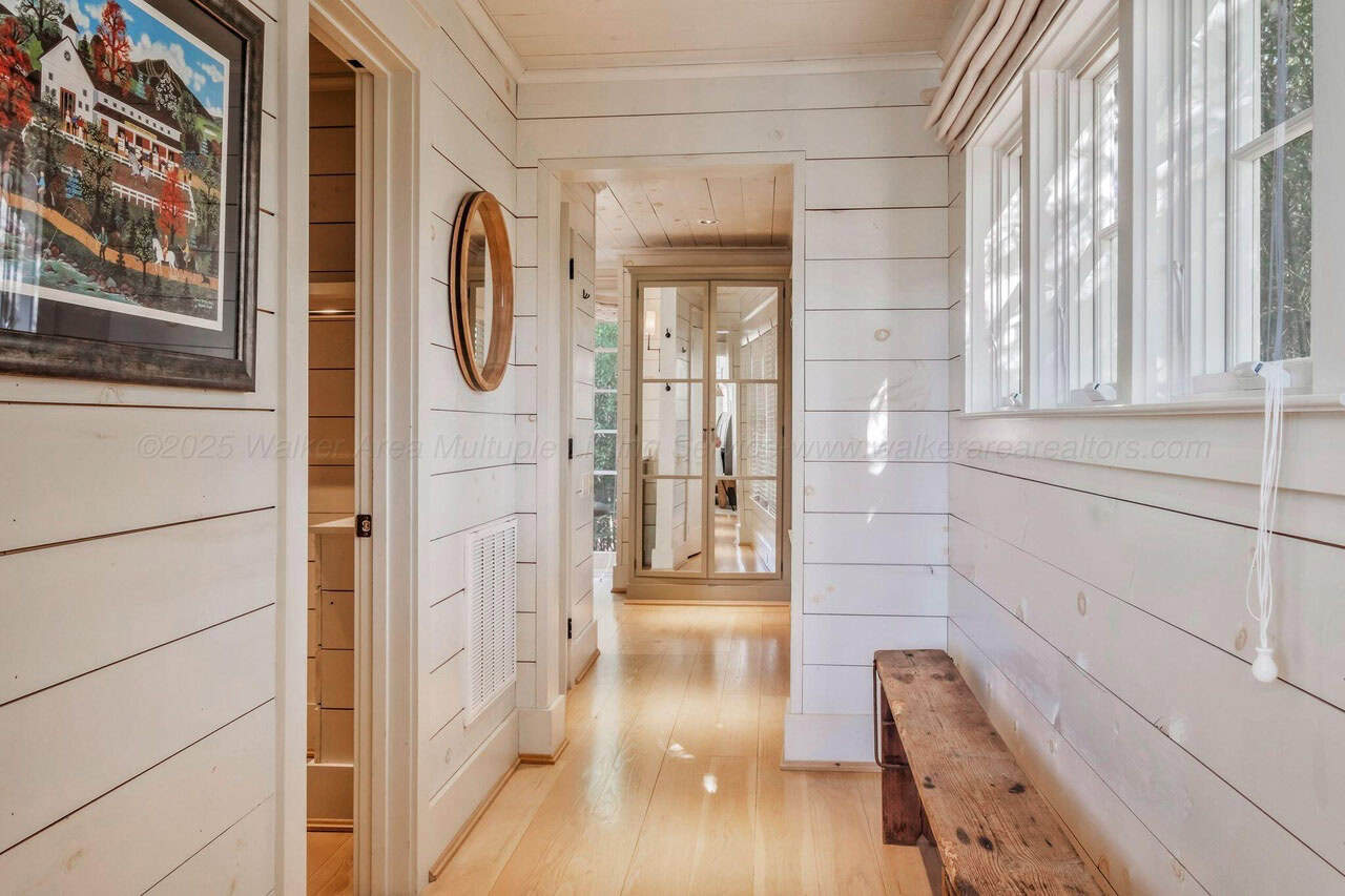 contemporary hallway with a bench