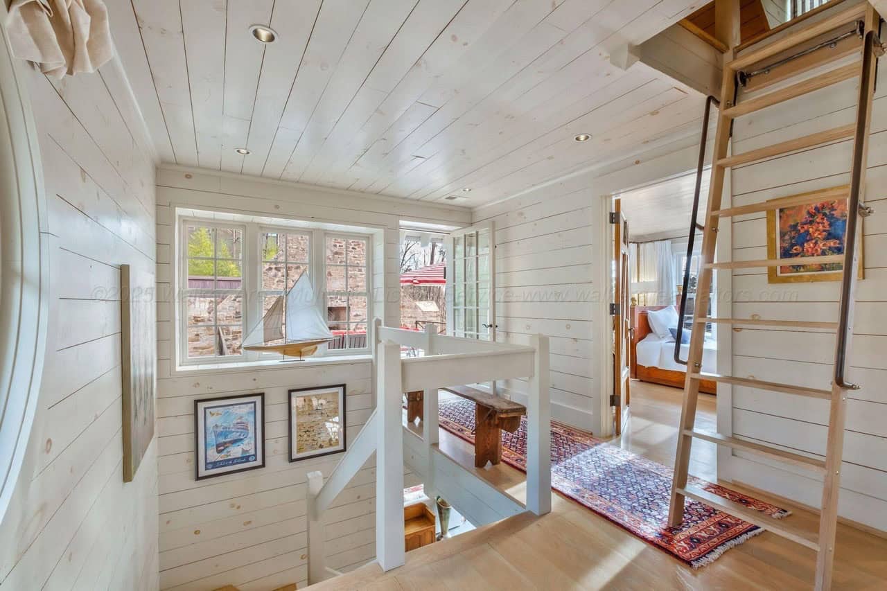 contemporary hallway with a ladder