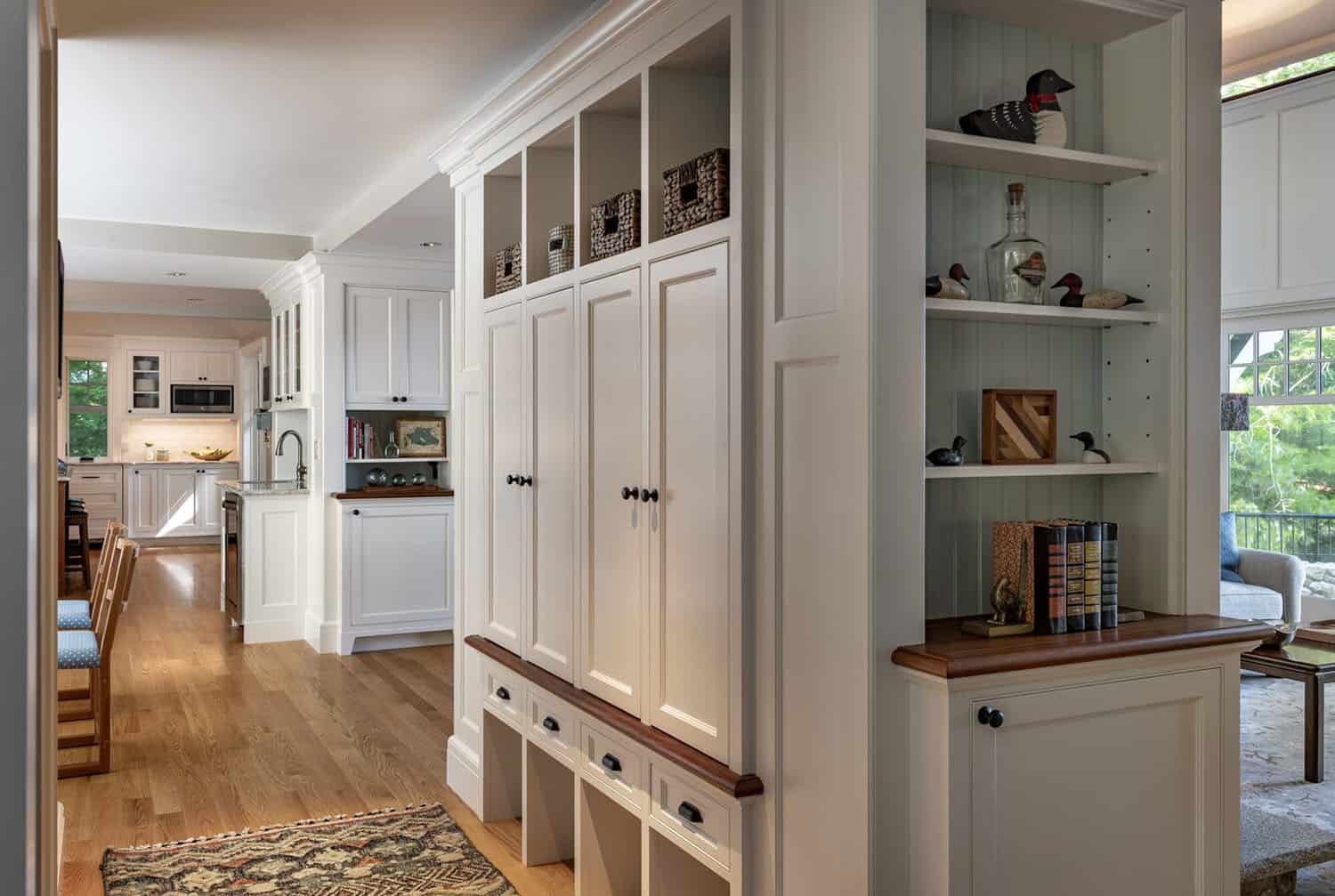 traditional style home entry with built-in cabinets