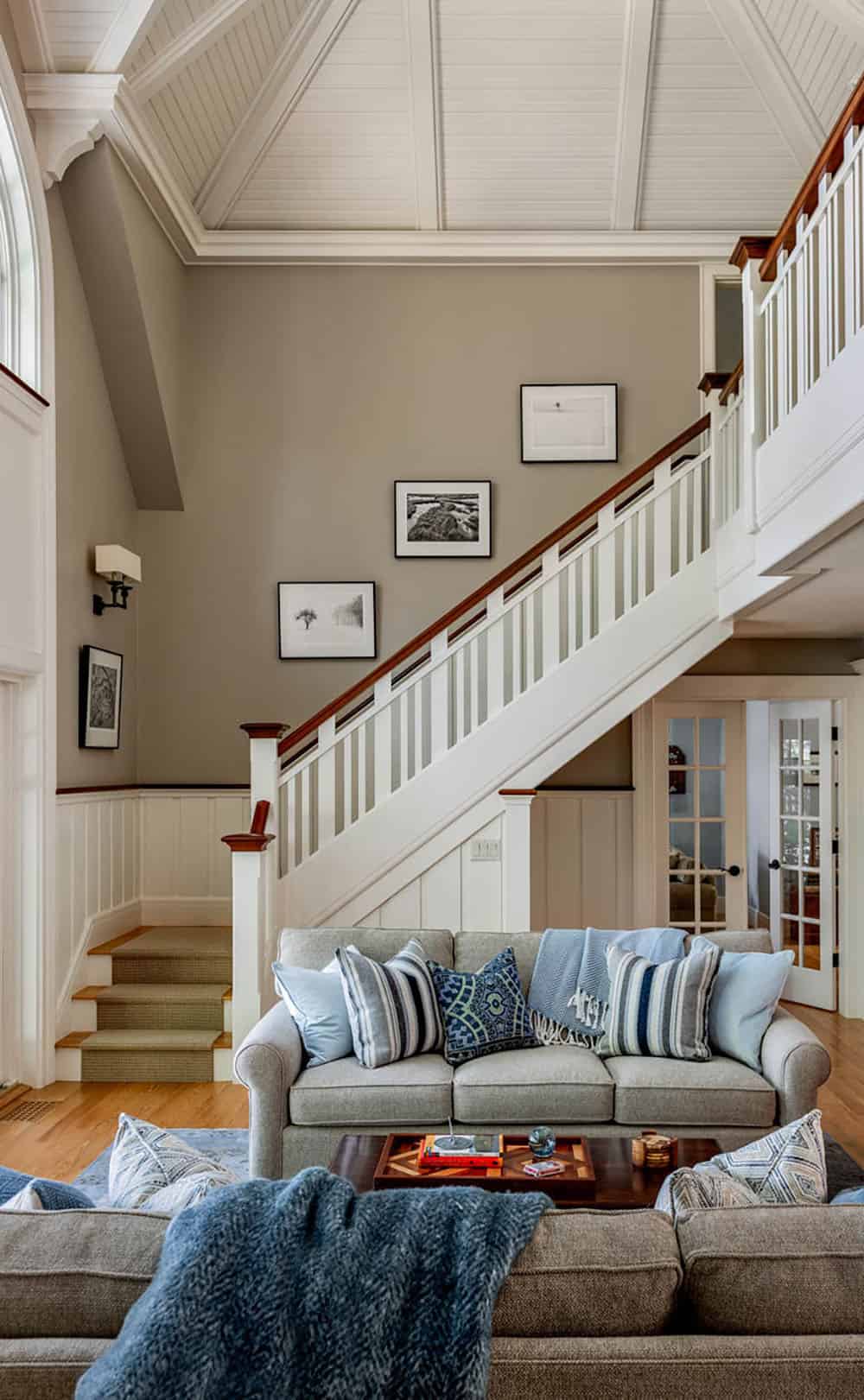 traditional style living room with a staircase