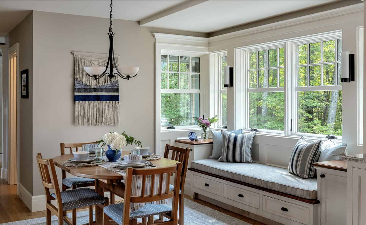 traditional style kitchen breakfast nook with a built-in window seat