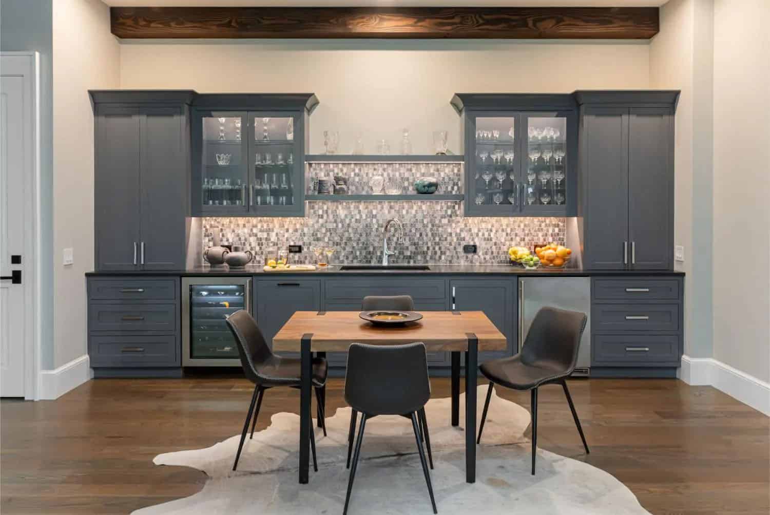 transitional style home bar with a dining nook