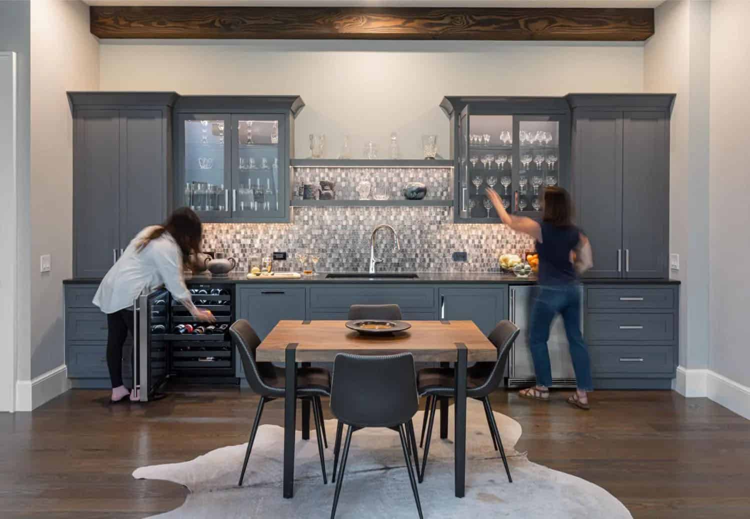 transitional style home bar with a dining nook