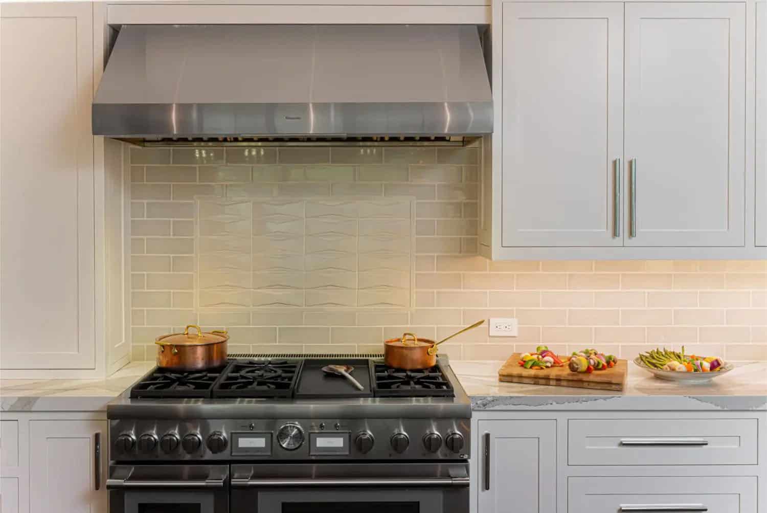transitional style kitchen range wall