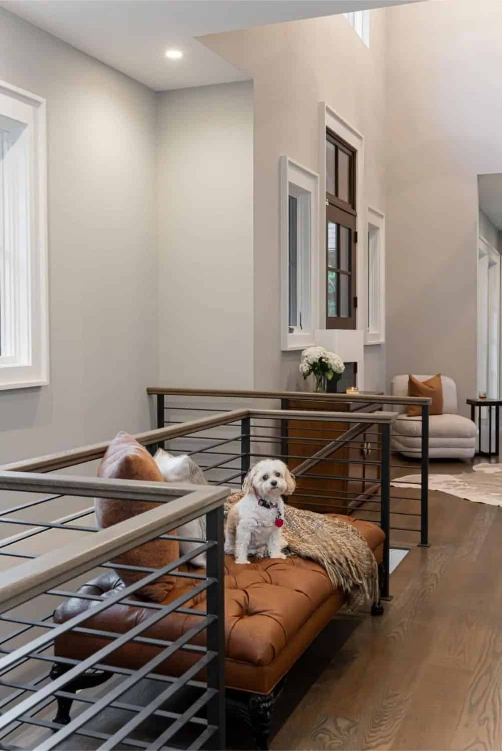 transitional style staircase landing with a bench seat