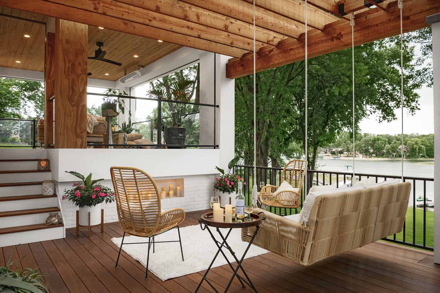 contemporary deck with a pergola and hanging swing bed