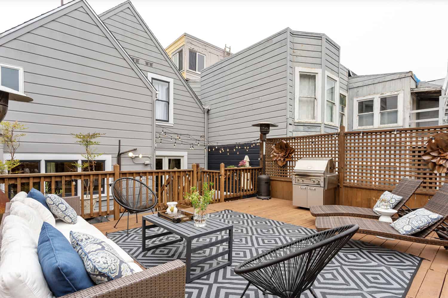 multi-level backyard deck with outdoor furniture