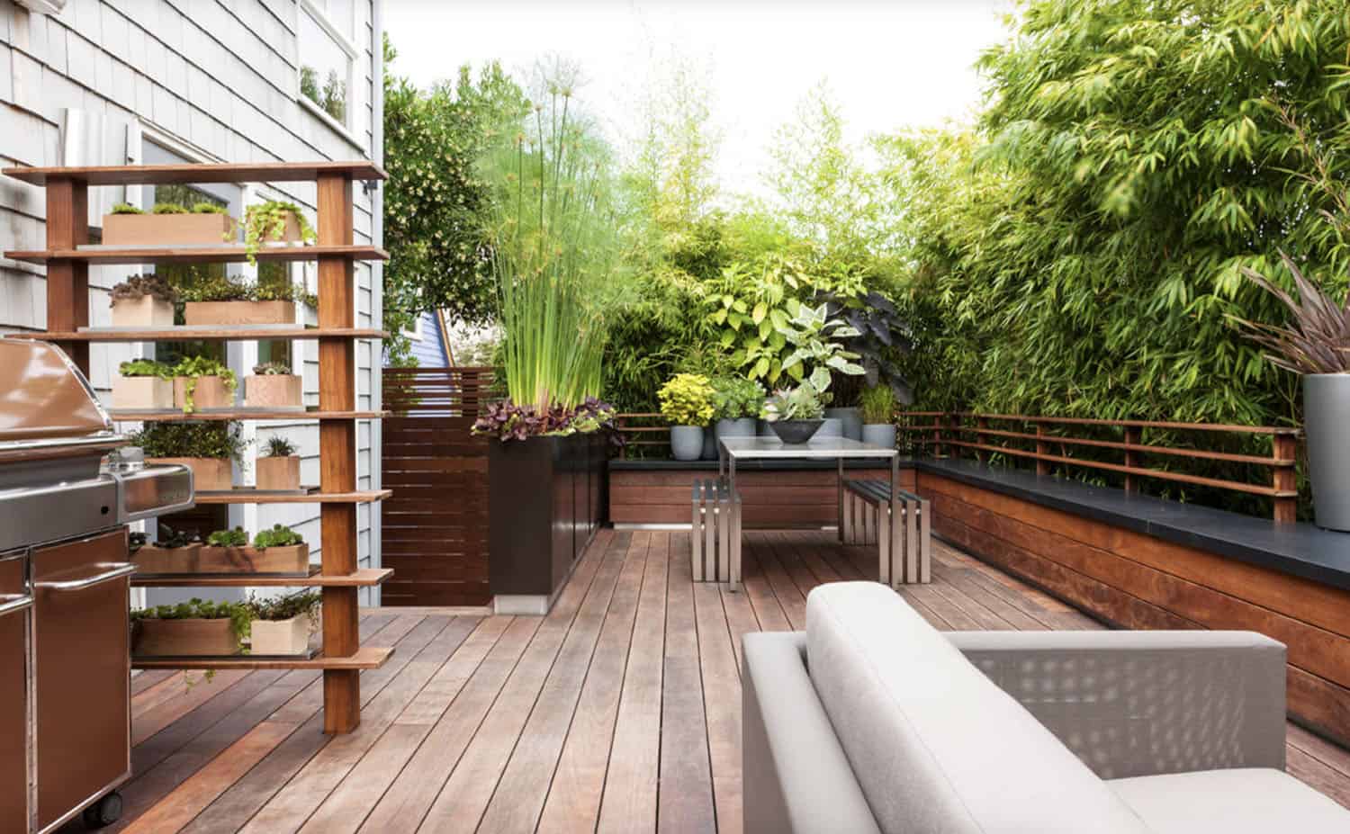 contemporary deck surrounded by a garden