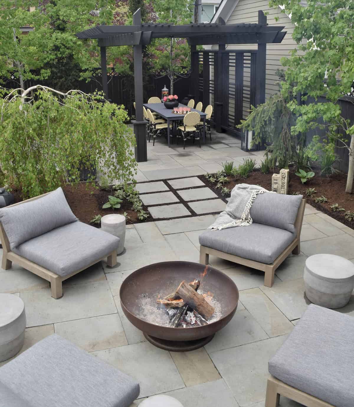contemporary patio with a fire pit