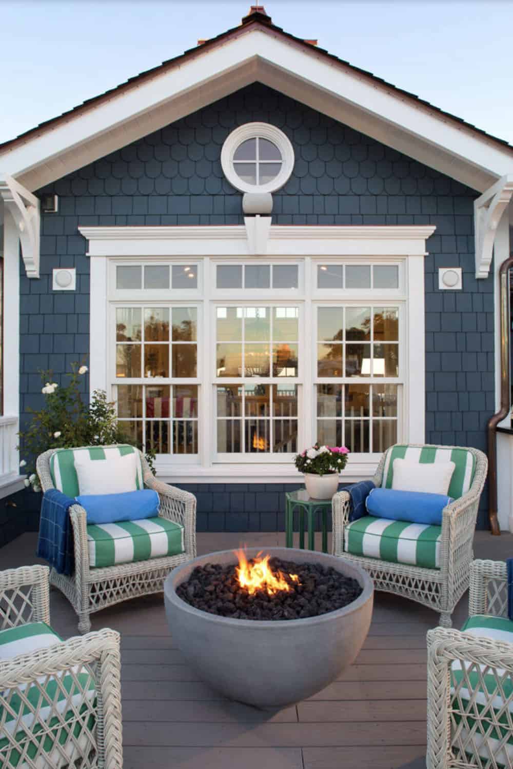 beach style deck with a fire bowl
