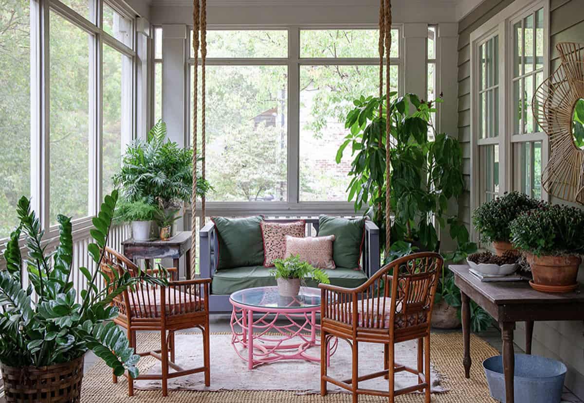 traditional style sunroom with furniture and plants
