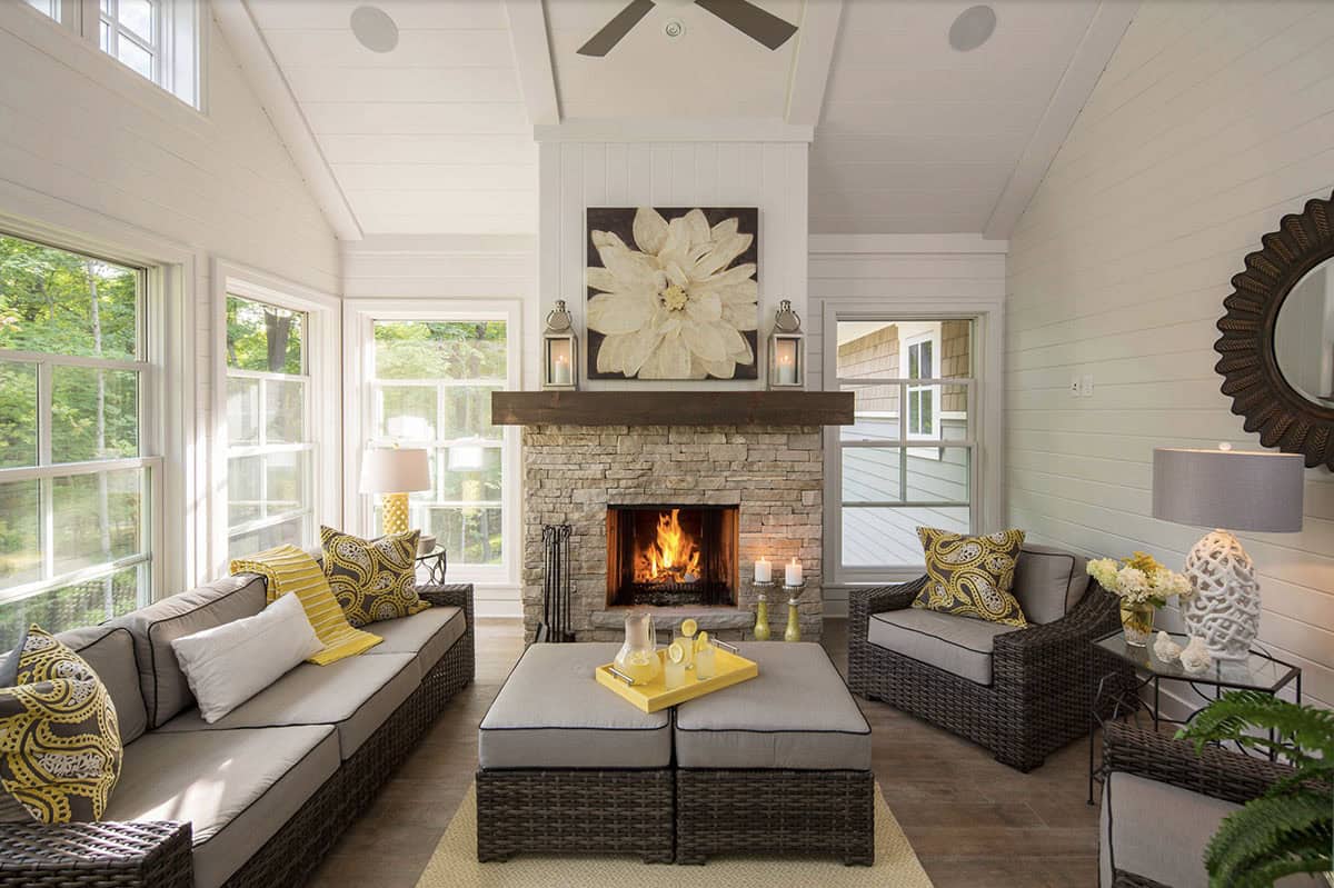 traditional style sunroom with a fireplace