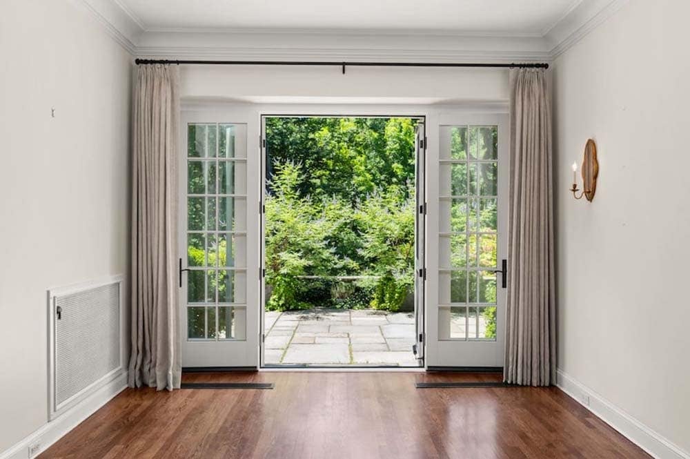 french doors leading out to a private patio