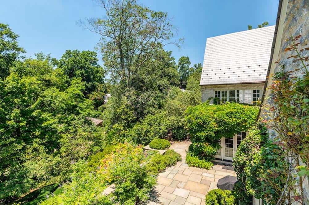 stone house exterior backyard landscape view