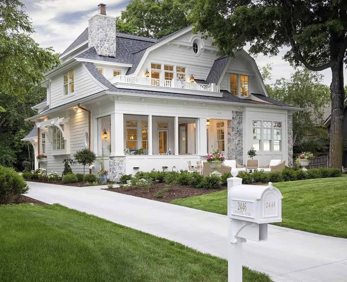 coastal cottage-style home exterior with a mailbox