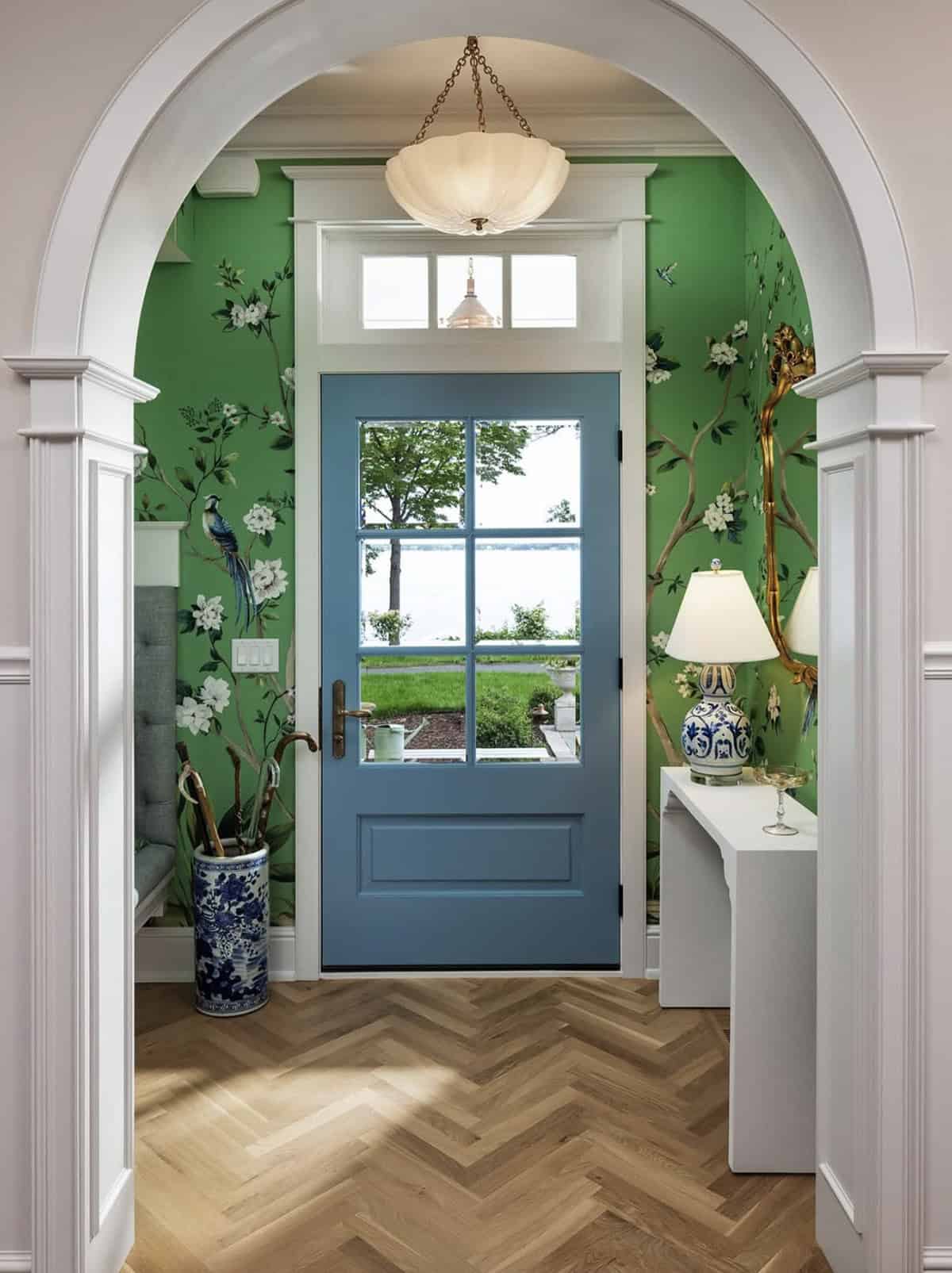 coastal cottage-style home entry with wallpaper