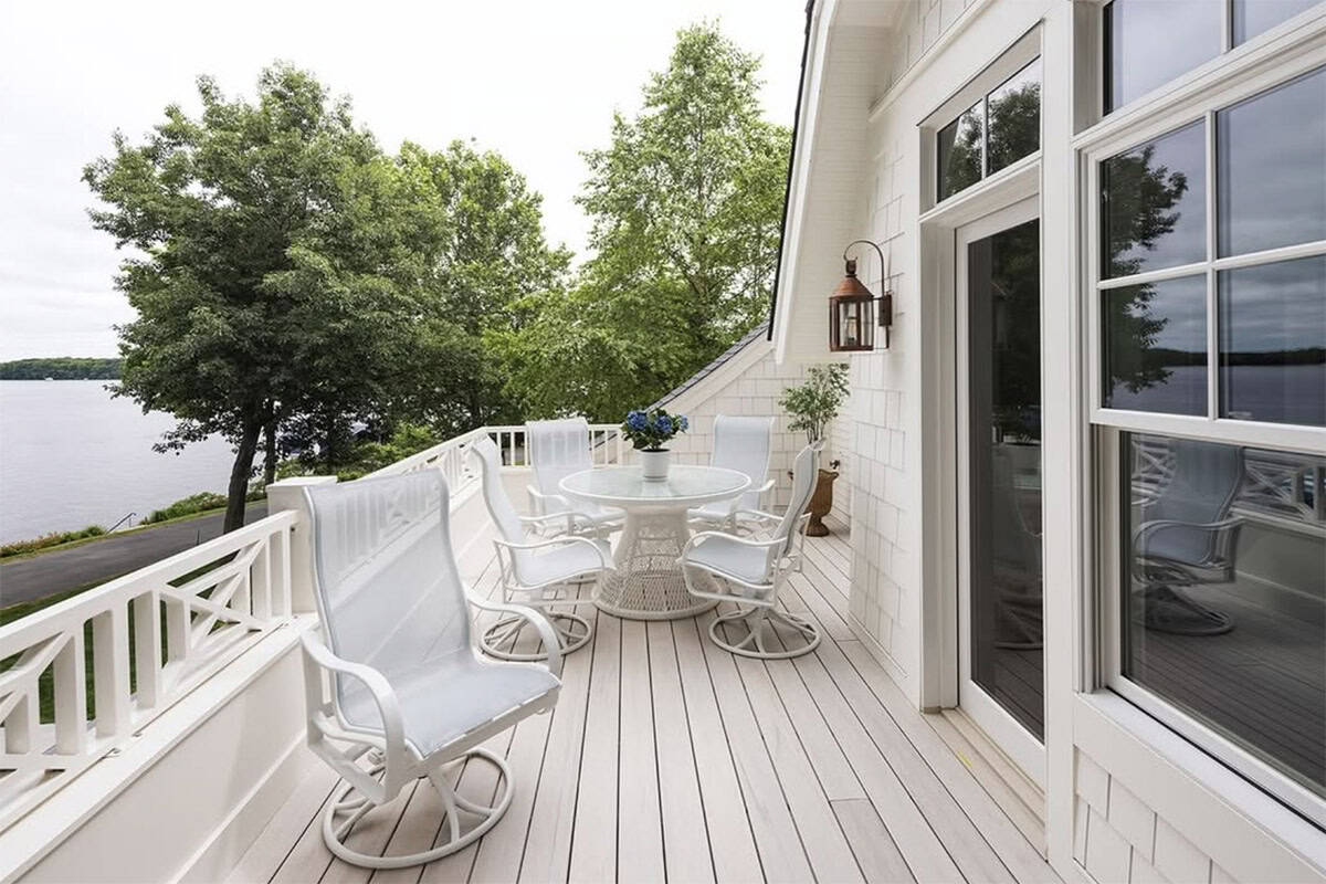 coastal cottage-style bedroom with a private balcony