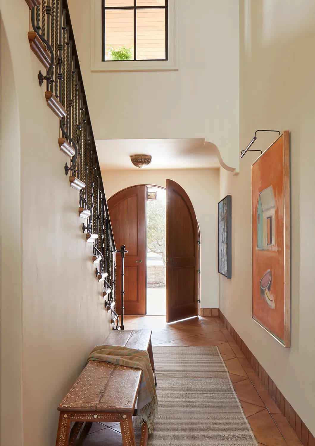 coastal home entry with a staircase