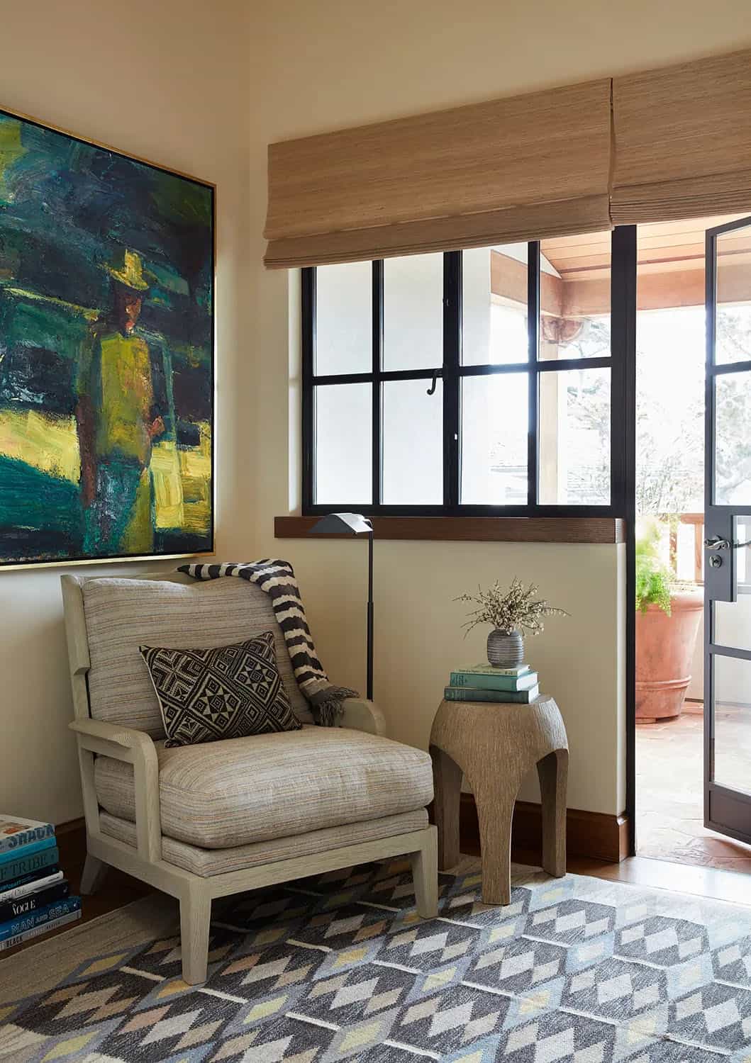 coastal style bedroom sitting area with a private balcony