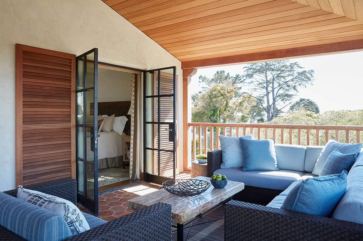 coastal style bedroom with a private patio