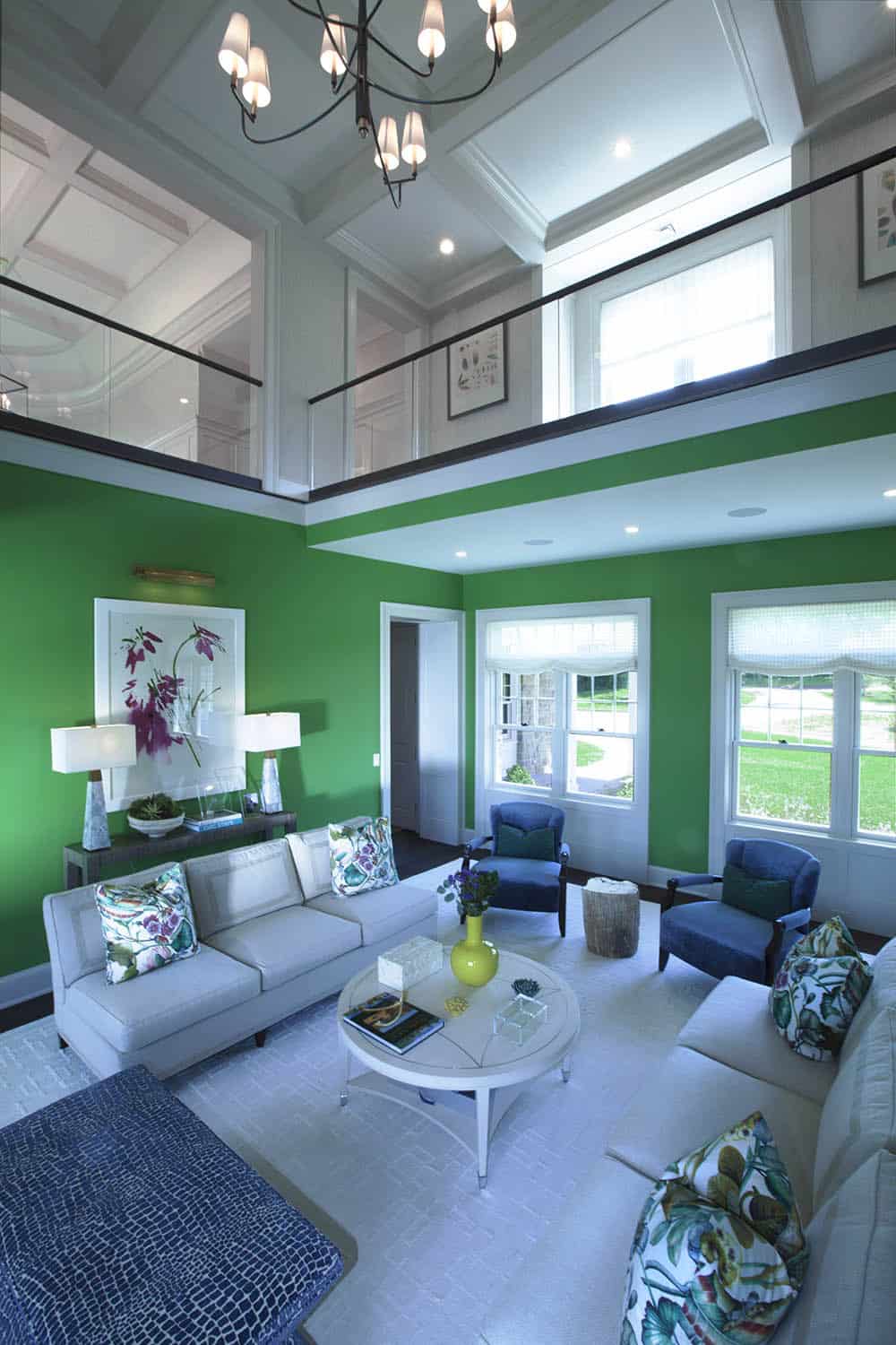 contemporary living room with green painted walls