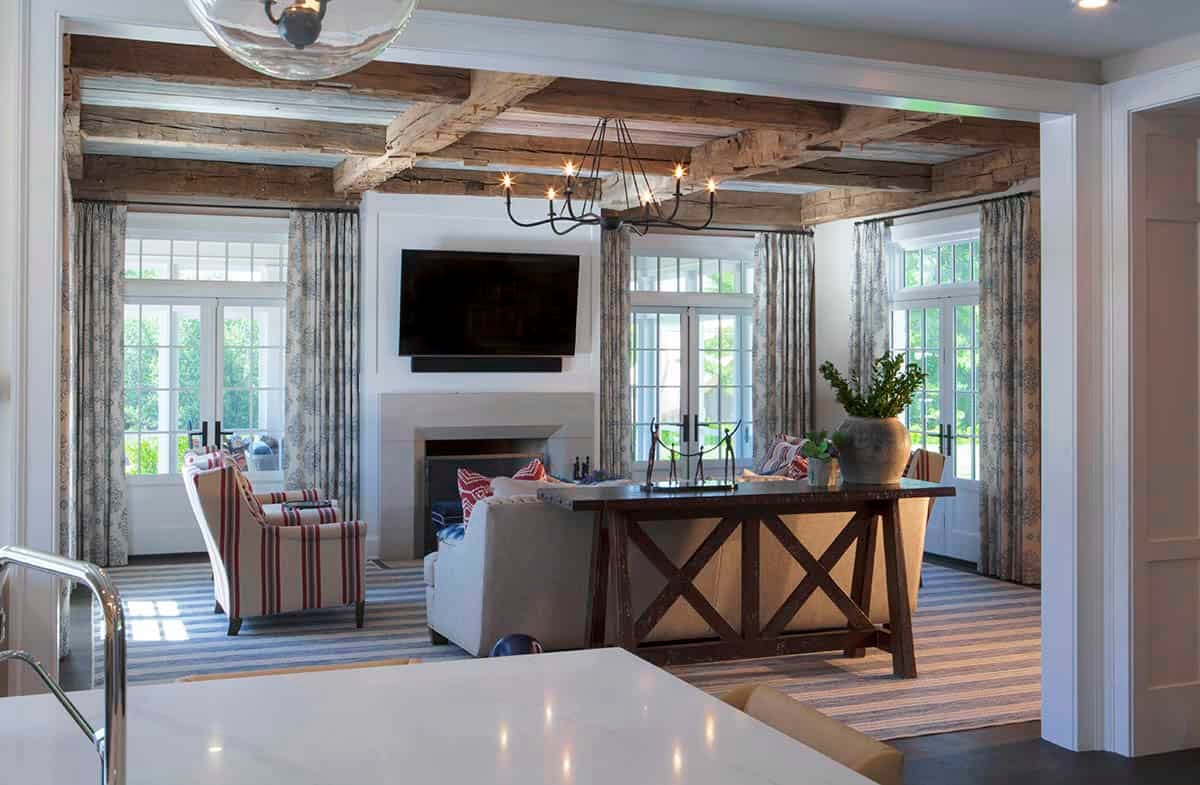 contemporary living room with wood beams on the ceiling