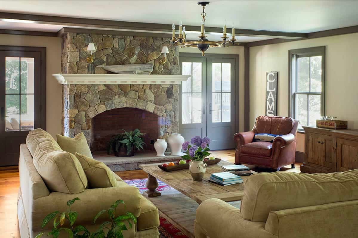 farmhouse style living room with a fireplace
