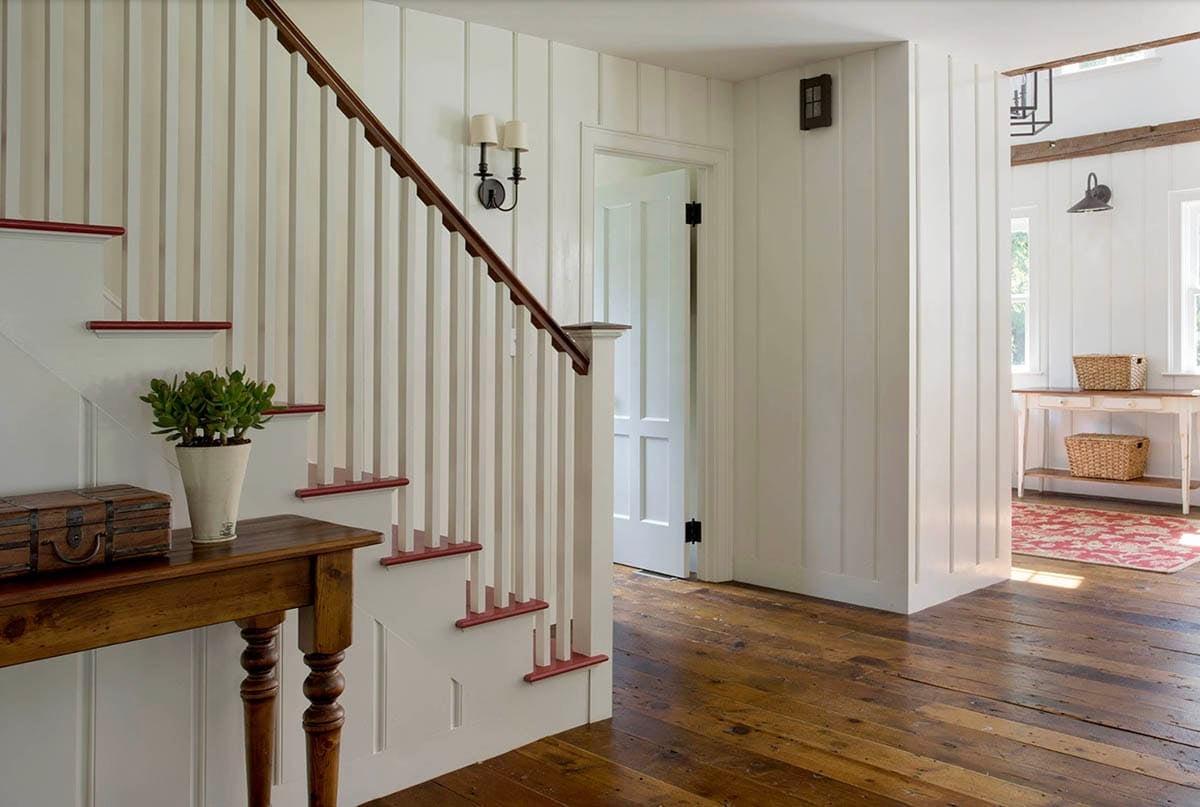 farmhouse style hallway with a staircase