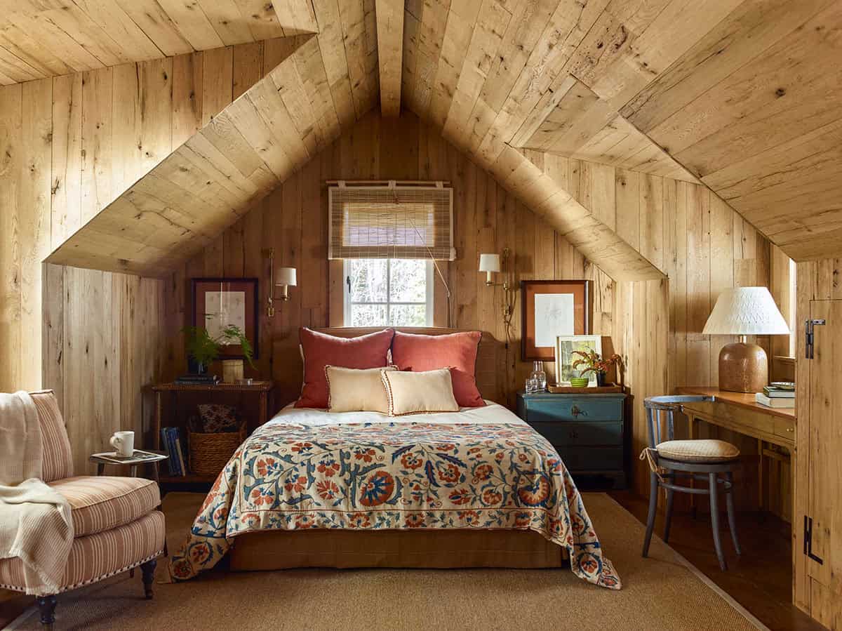 rustic bedroom with a vaulted ceiling
