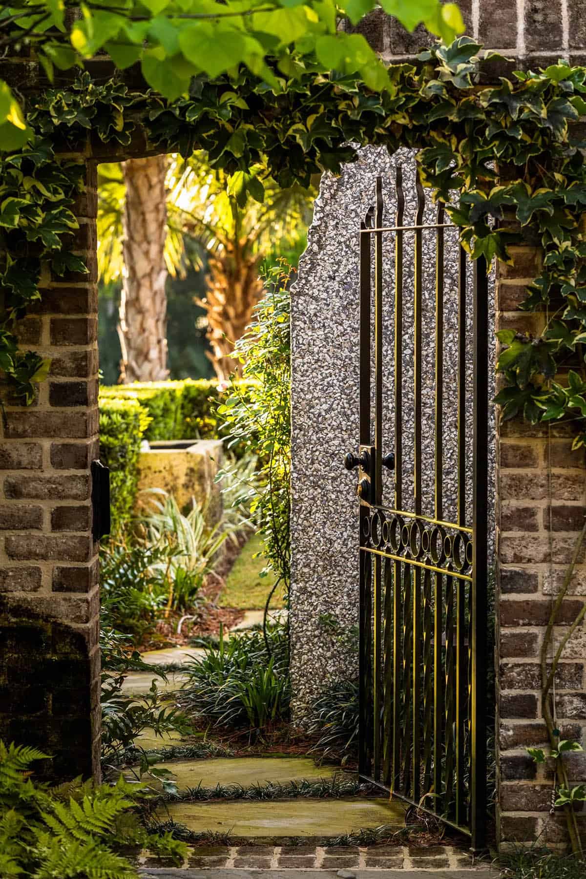 island retreat courtyard with an iron gate