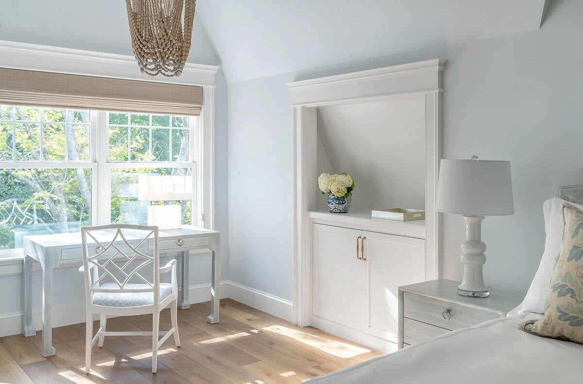 beach style bedroom with a writing desk