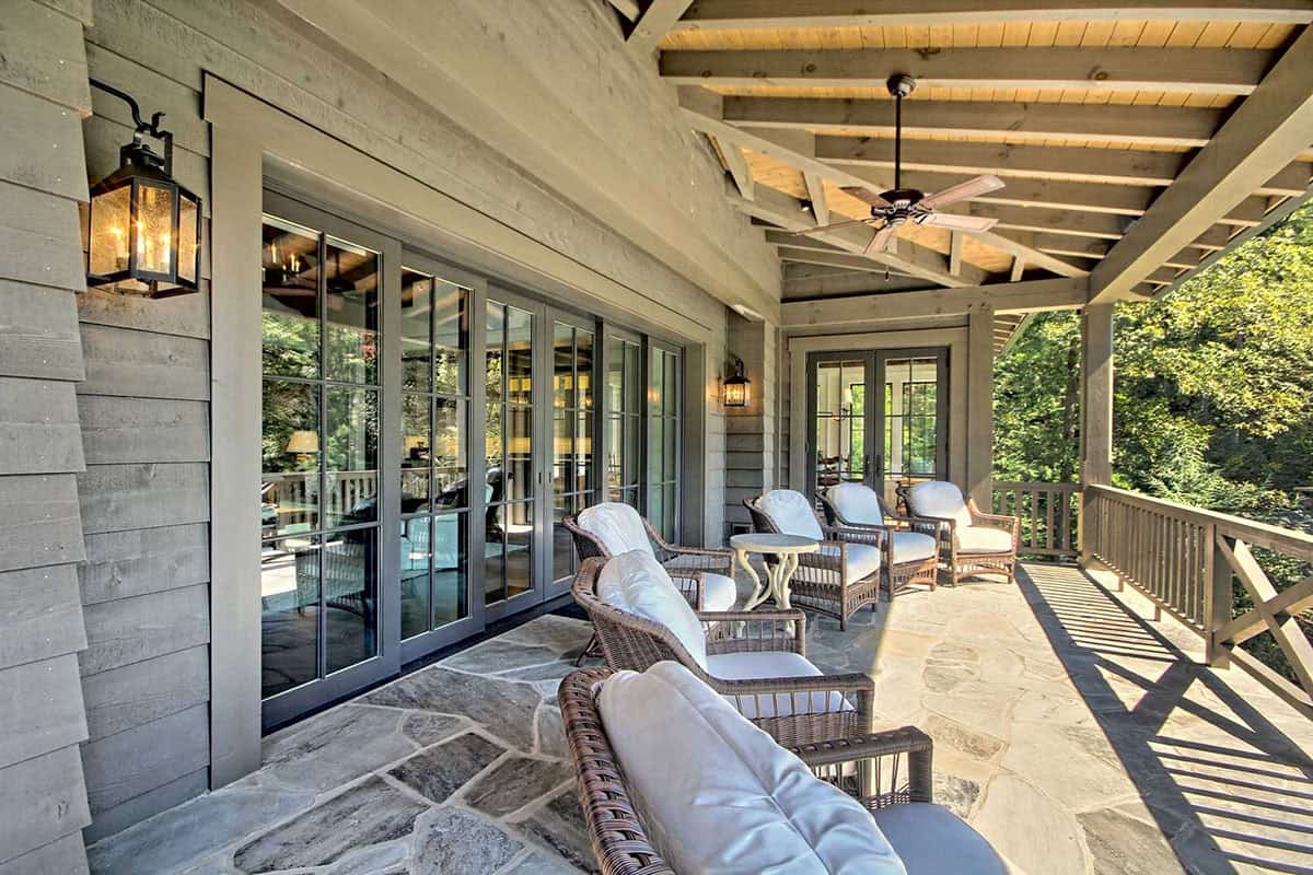 farmhouse style covered patio with outdoor furniture