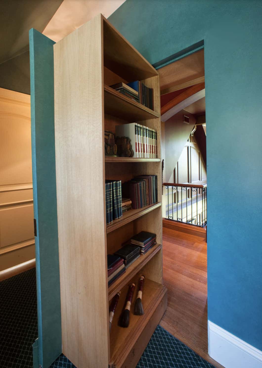 traditional style hallway with a hidden door