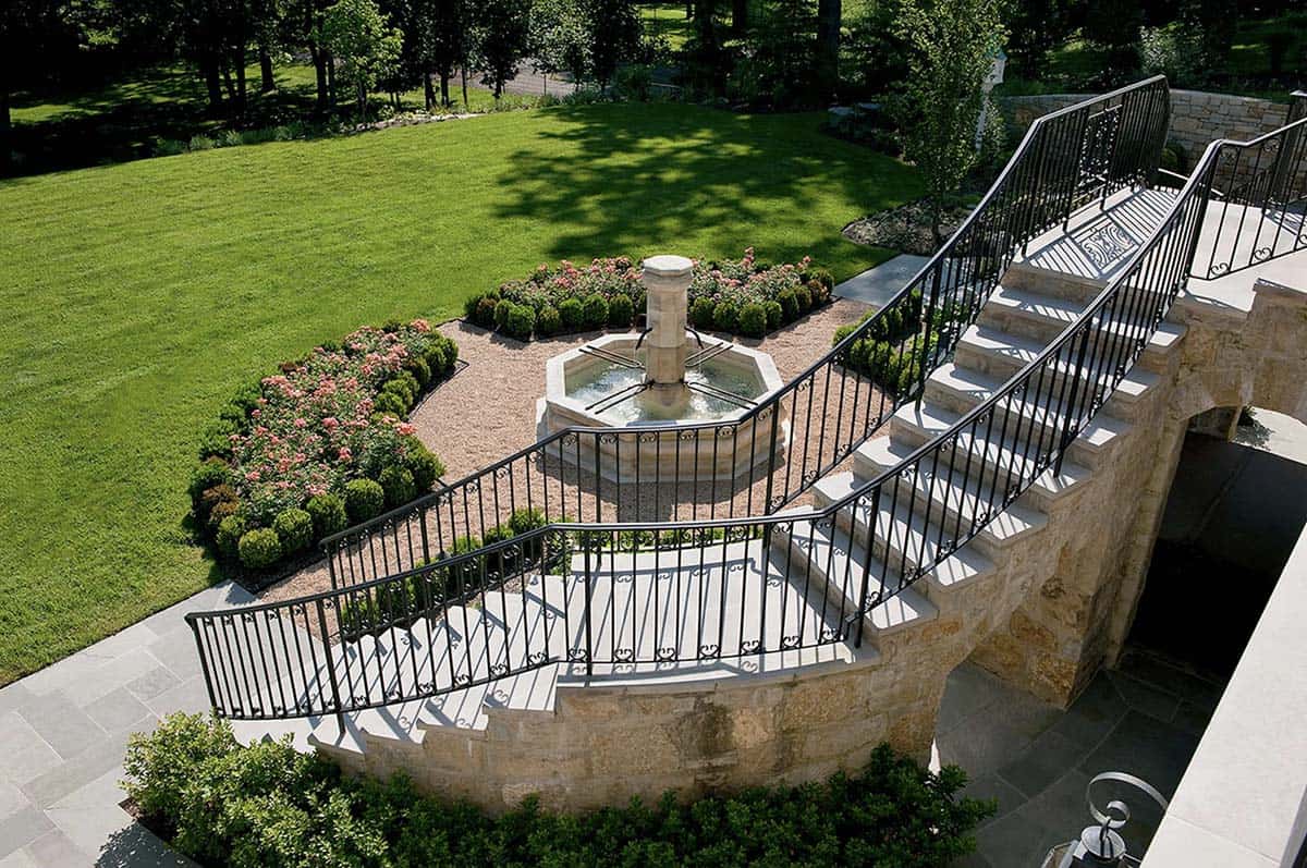 french country house exterior with a staircase