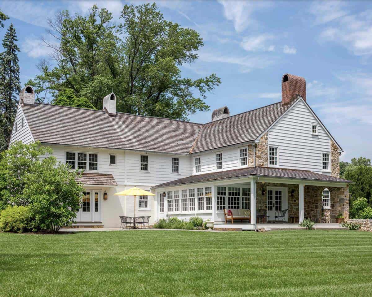 historic farmhouse home exterior backyard view