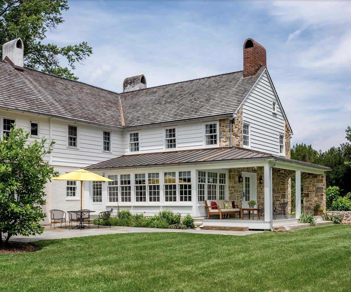 historic farmhouse home exterior backyard view