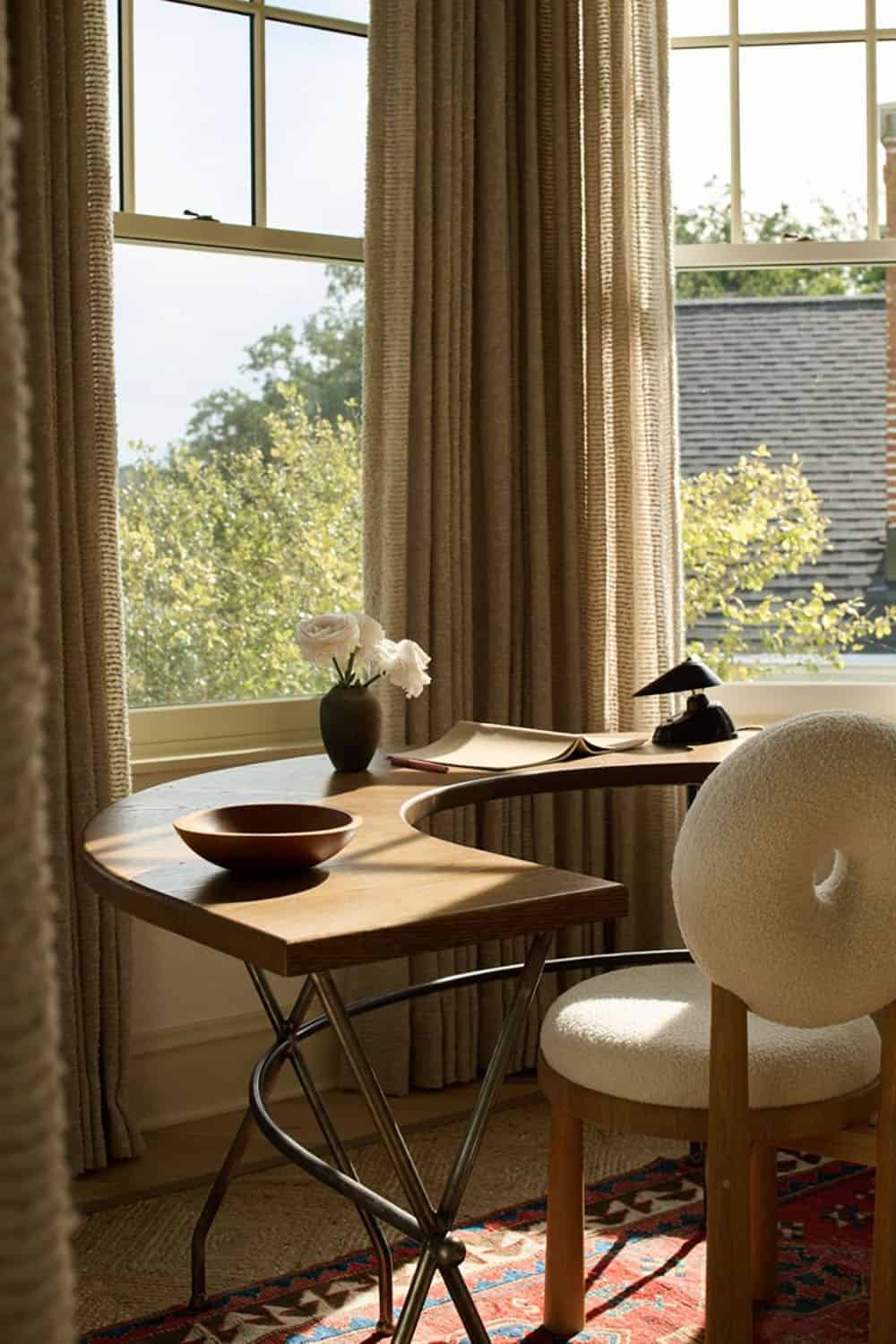contemporary bedroom with a writers desk