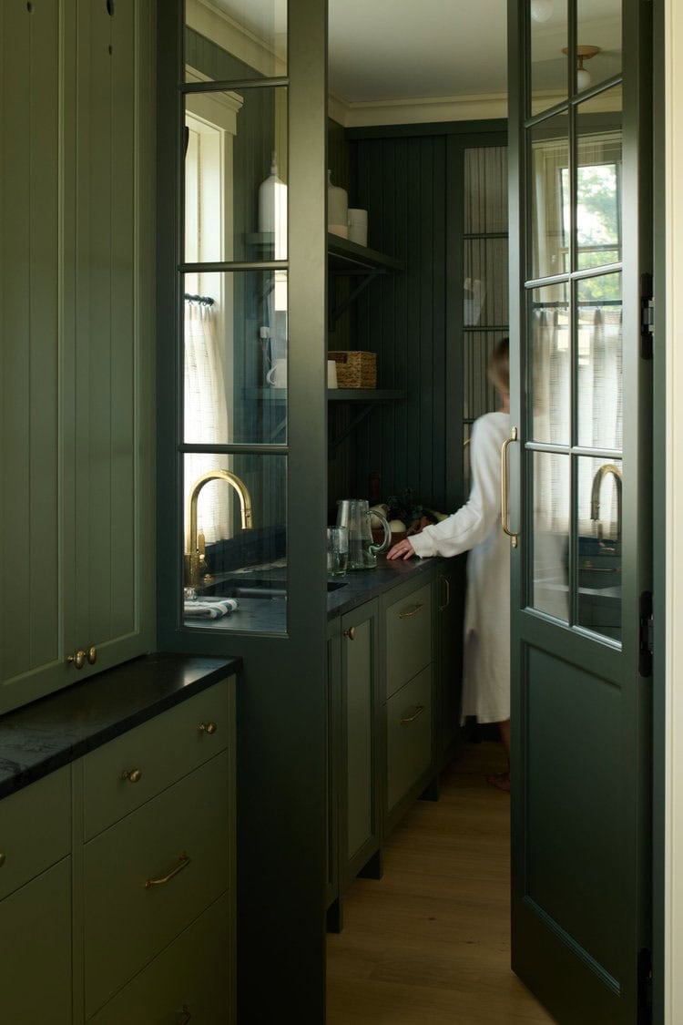 contemporary kitchen pantry with a sink