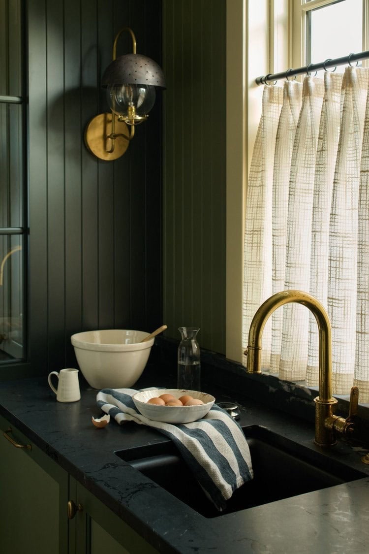 contemporary kitchen pantry with a sink