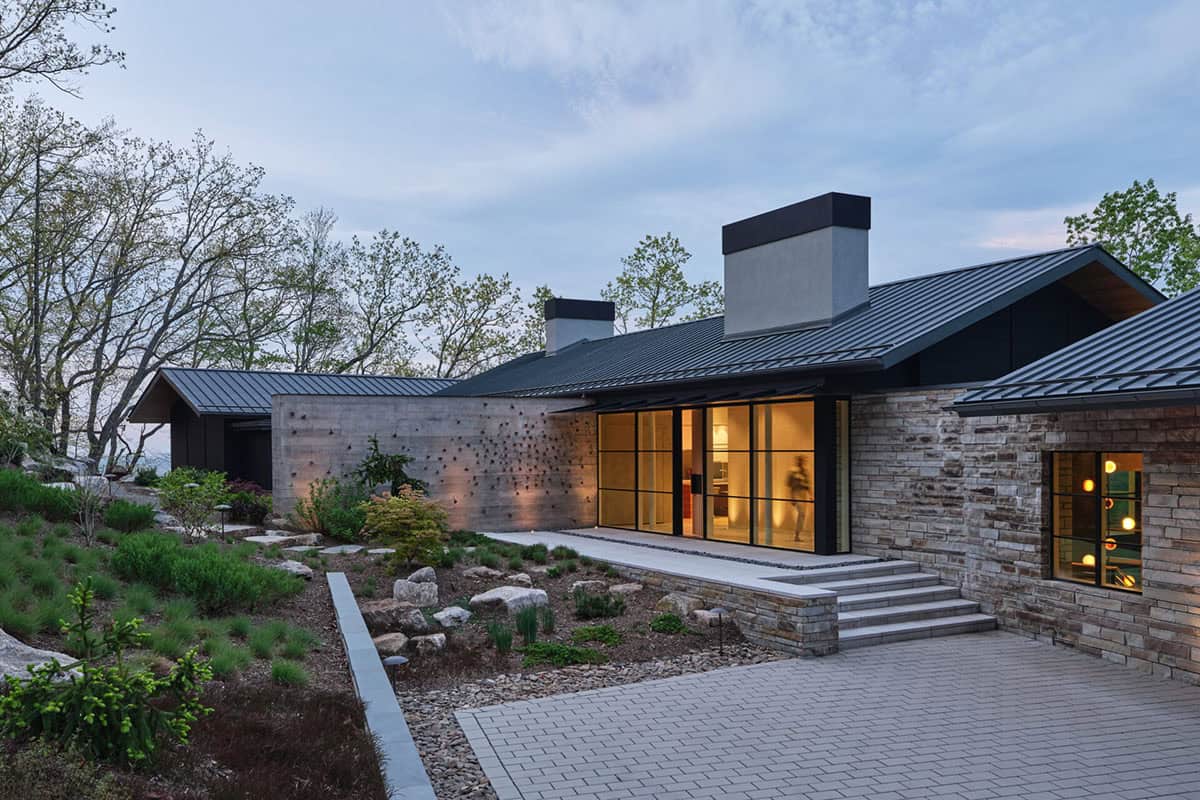 Japanese-inspired mountain house exterior at dusk